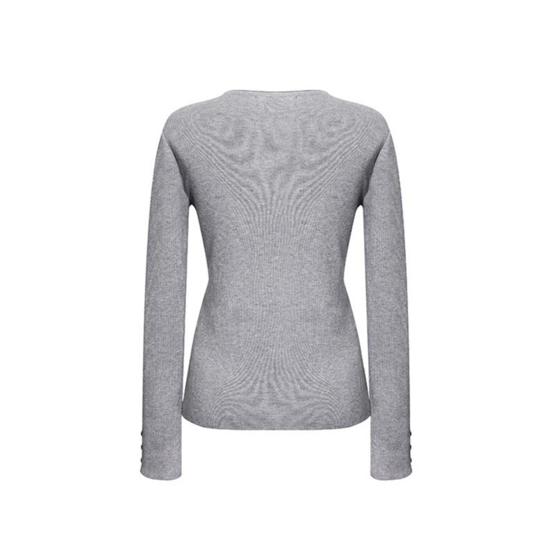 Women's fine knit sweater with round neckline, slim silhouette, and decorative button sleeves Amarae