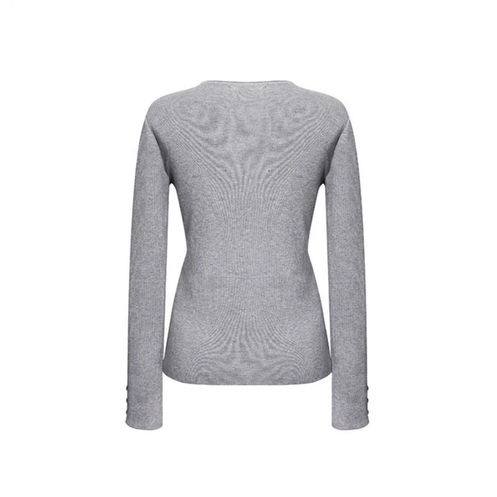 Women's fine knit sweater with round neckline, slim silhouette, and decorative button sleeves Amarae