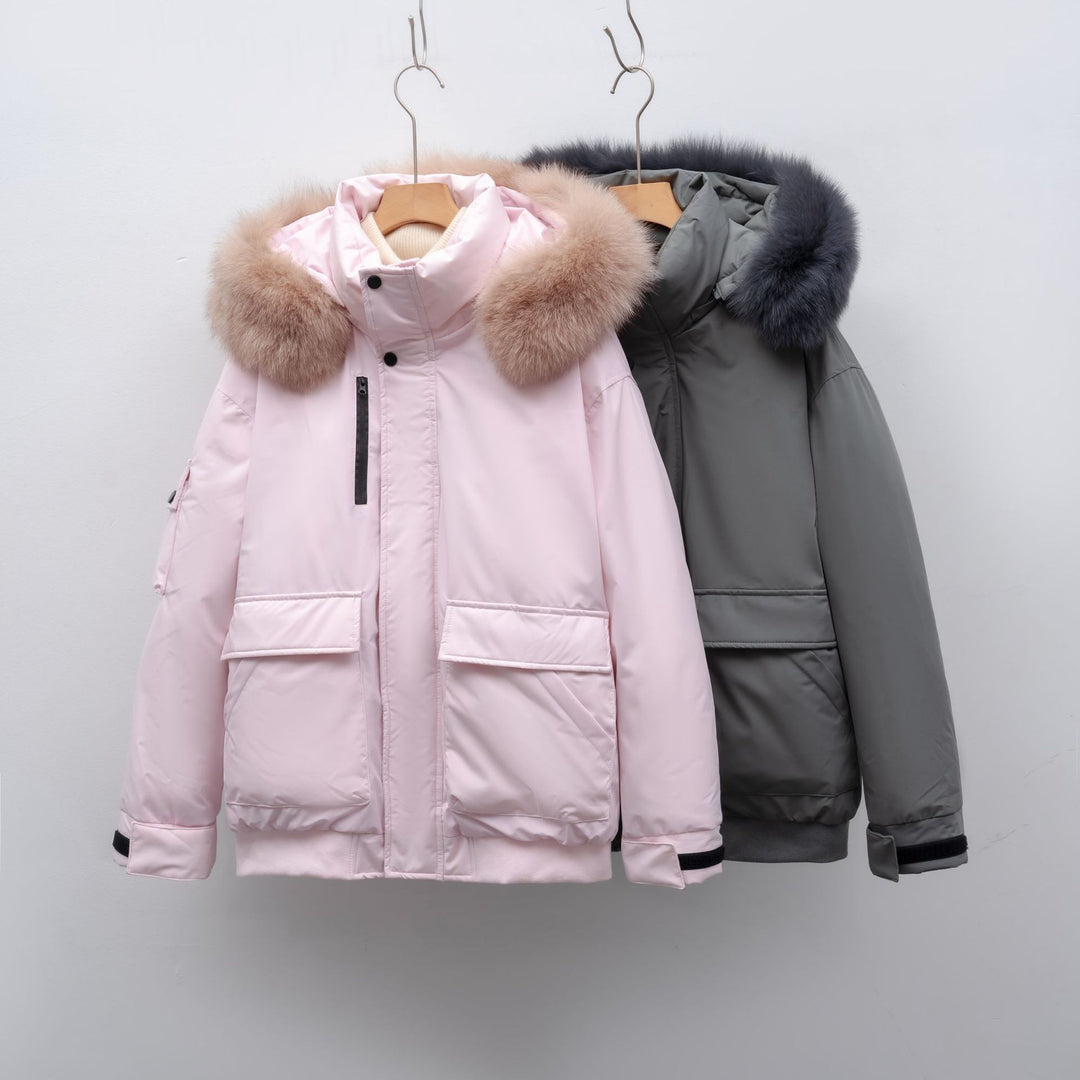 Winter coat for women with bulky faux fur collar and functional pockets Lune London