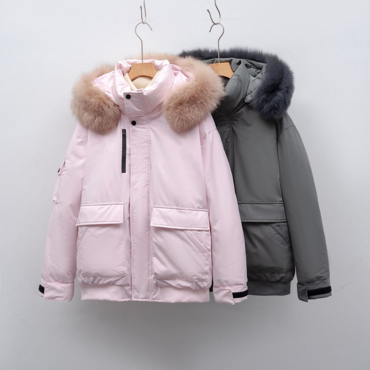 Winter coat for women with bulky faux fur collar and functional pockets Lune London