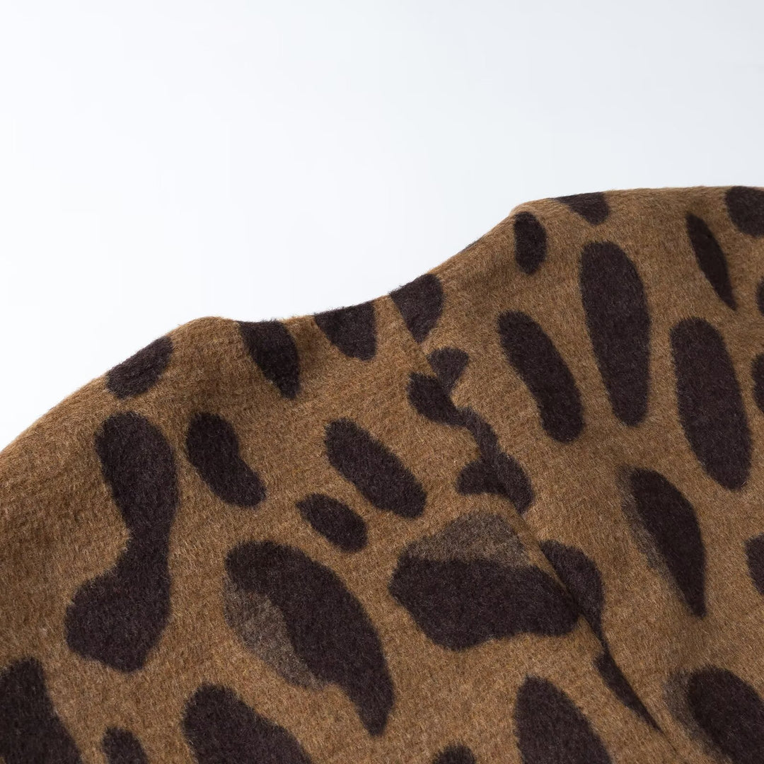 Ladies sleeveless wool blend vest in leopard print with V-neck and decorative button Amarae