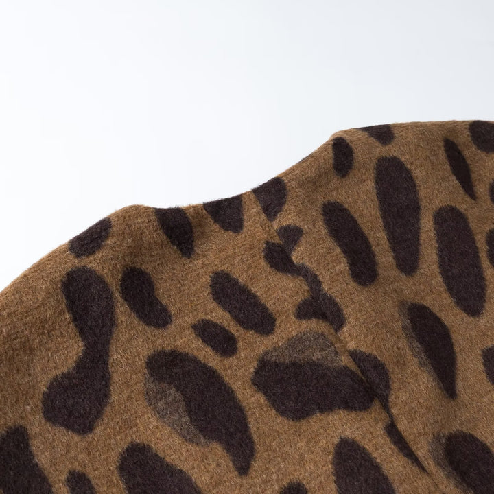 Ladies sleeveless wool blend vest in leopard print with V-neck and decorative button Amarae