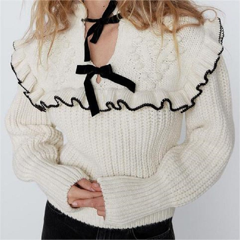 Knitted sweater for women with ruffled collar and decorative bows Lune London