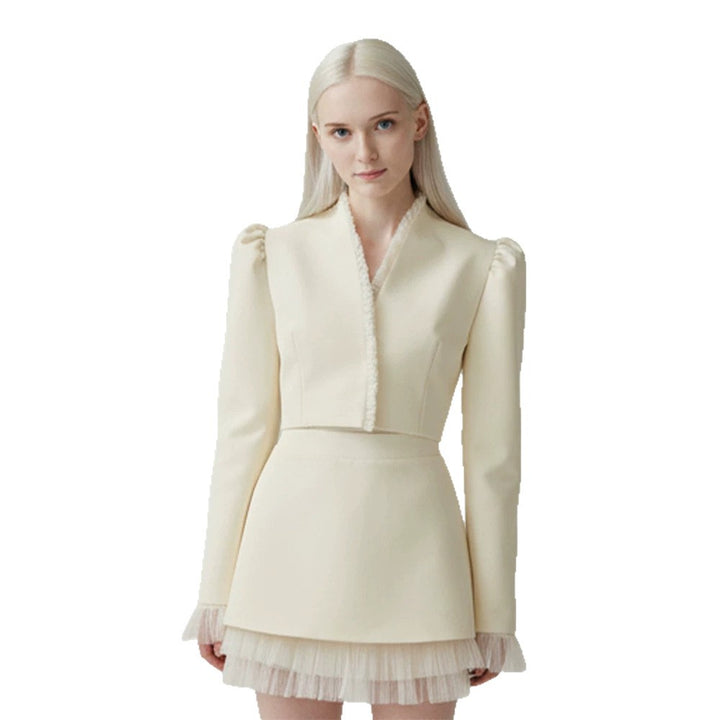 Ladies short blazer with tailored cropped silhouette, gathered shoulders and delicate tulle cuffs Amarae
