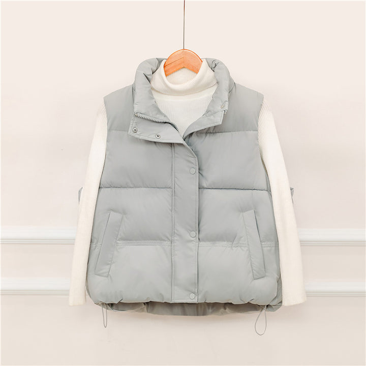 Sporty quilted vest for women with high collar and practical pockets Lune London