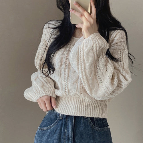 Cozy knitted sweater for women with cable pattern Amarae
