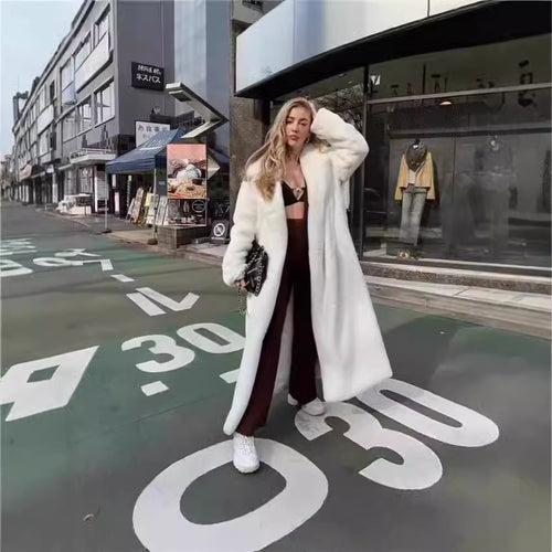 Oversized faux fur coat for women with hood and textured design Amarae