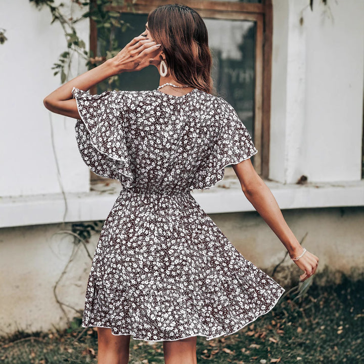 Ladies Twirl Dress with Flowing Floral Sleeves Lune London