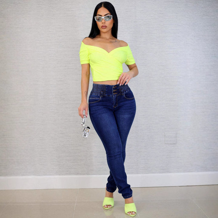 High-waisted skinny jeans for women with elastic waistband and decorative buttons Chic & Stil