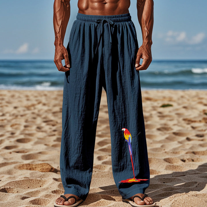 Light beach pants for men with colorful parrot design Lune London