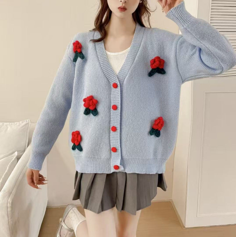 Women’s playful knitted cardigan with floral appliqués and Moon London button details