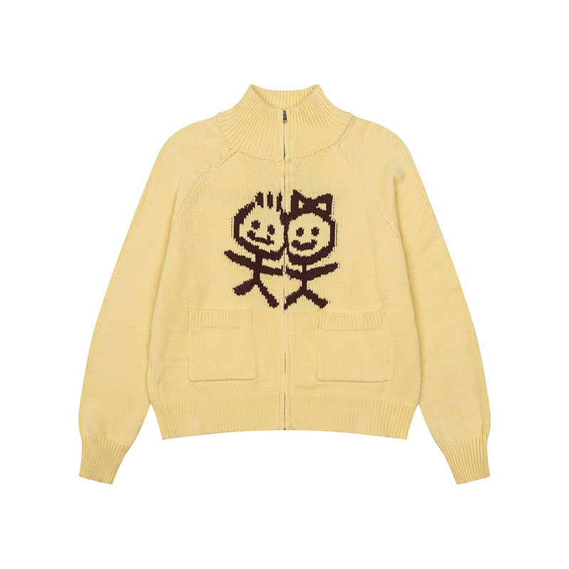 Women's chunky knit zip cardigan with stand-up collar, patch pockets and cartoon intarsia Amarae