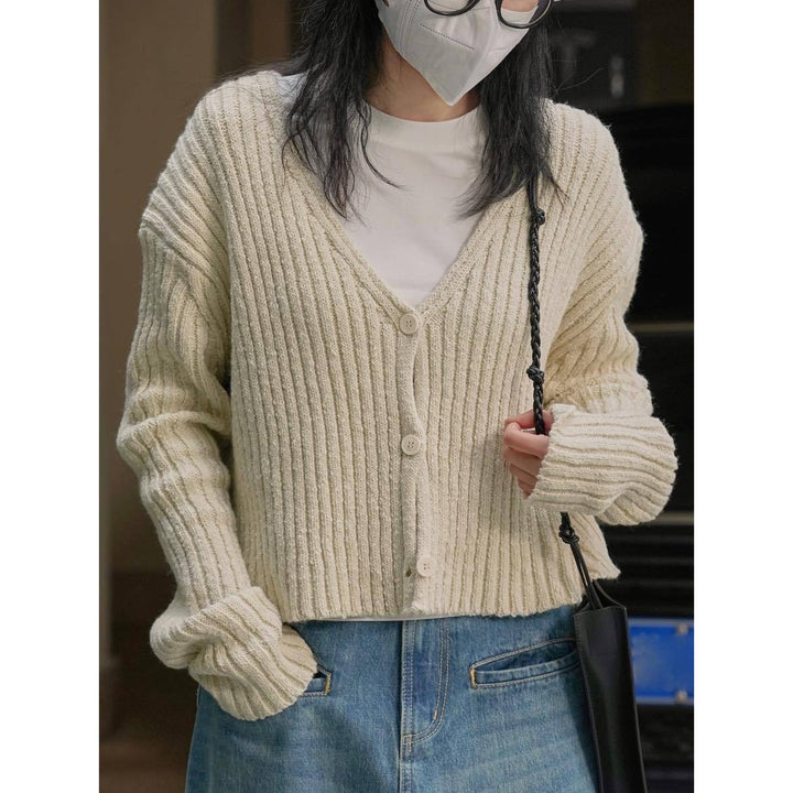 Women's Knitted V-Neck Cardigan in a distinctive ribbed pattern with short length and casual sleeves Amarae