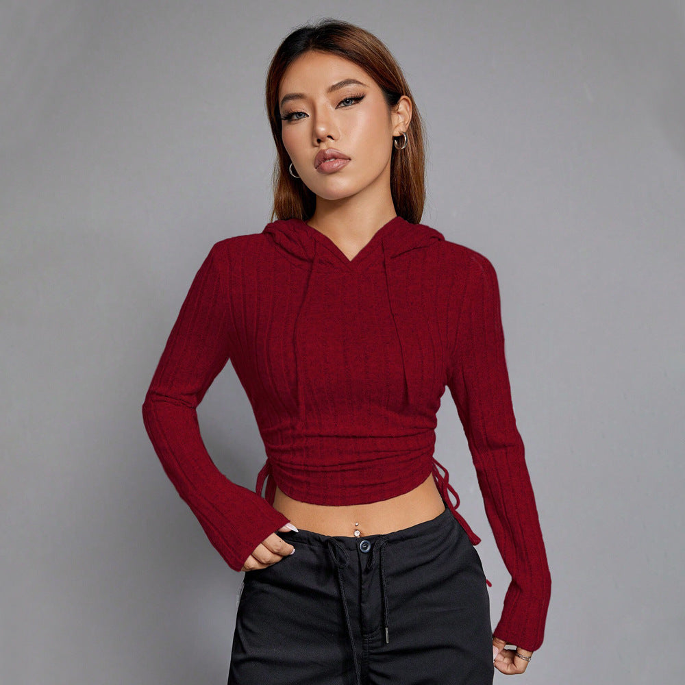Haut court pour femme avec manches longues et motif en relief élégant Chic & Stil
