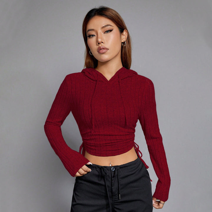 Haut court pour femme avec manches longues et motif en relief élégant Chic & Stil