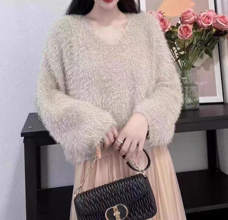 Pull V-neck pour femmes en tricot douillet avec fil à paillettes Chic & Stil