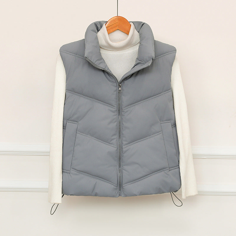 Ladies padded gilet with high collar and practical front pockets Amarae