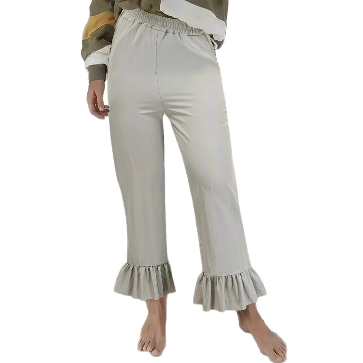 Women's flared pants with playful ruffle details Lune London