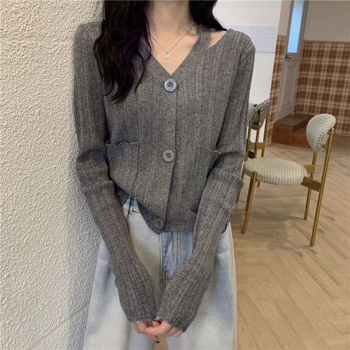 Cardigan élégant pour femmes avec col en V et poches Chic & Stil