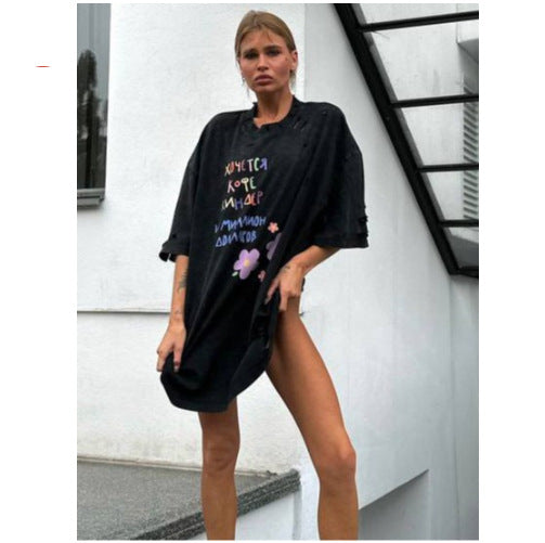 Oversized T-shirt dress for women with a unique graphic tear design Lune London