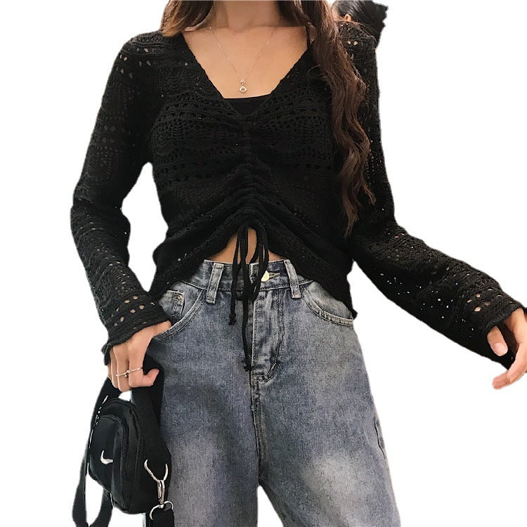 Knit sweater for women with a decorative hole pattern and an adjustable drawstring Lune London