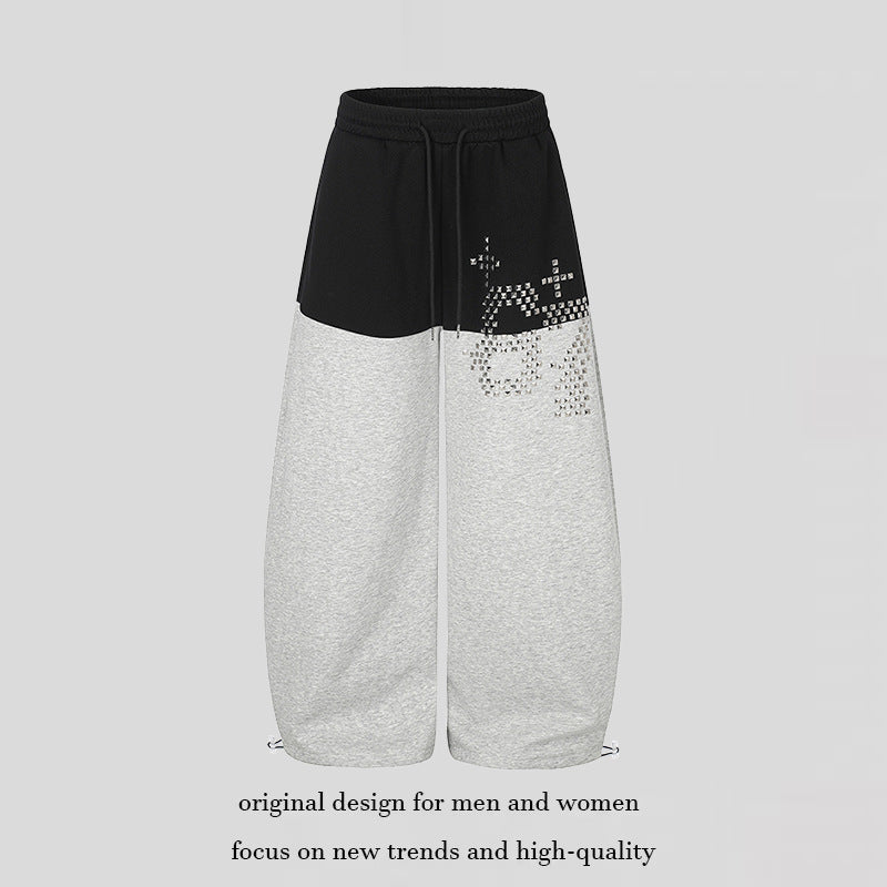 Women's Oversize Two-Tone Palazzo Sweatpants made of French Terry with logo studs, drawstring and adjustable hem.