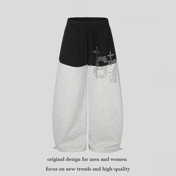 Women's Oversize Two-Tone Palazzo Sweatpants made of French Terry with logo studs, drawstring and adjustable hem.