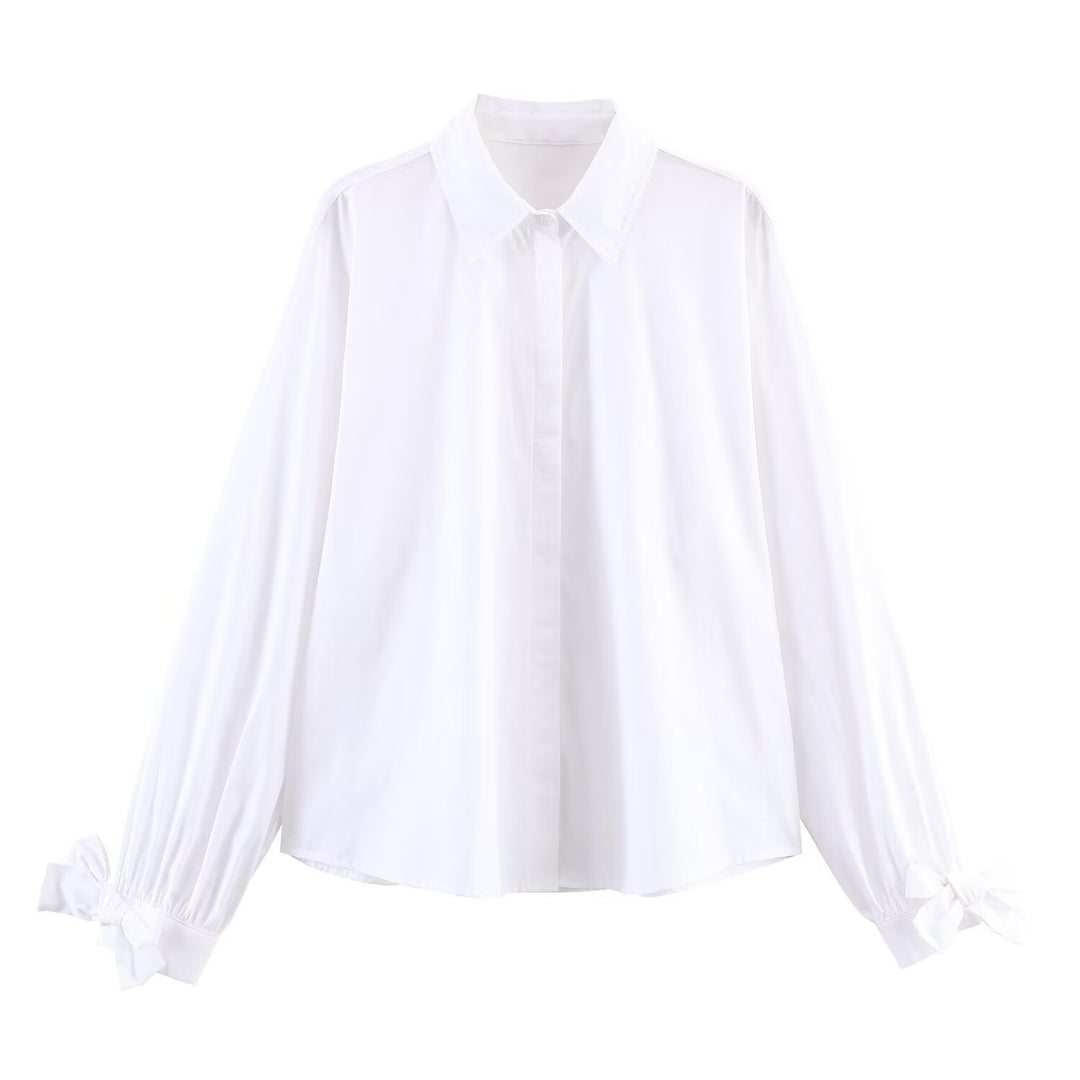Women's oversized shirt blouse with classic collar, balloon sleeves, and bow cuffs Amarae