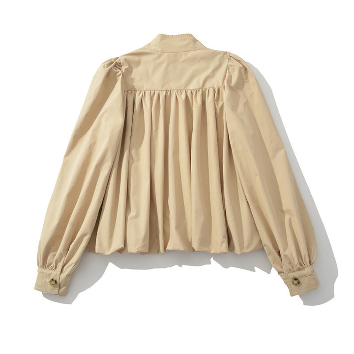 Stylish women's bomber jacket with unique draping and chic button details