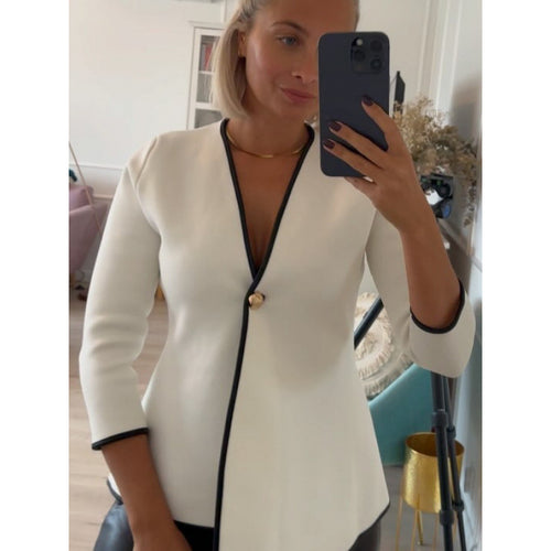 Elegant women's jacket with asymmetric cut and metallic button Amarae