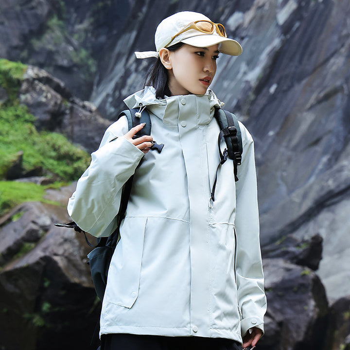 Women’s technical multi-layer hardshell rain jacket with adjustable hood, chest strap, and water-resistant zippers Amarae