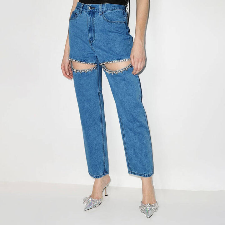 Women's jeans with decorative cutouts and rhinestone accents Lune London