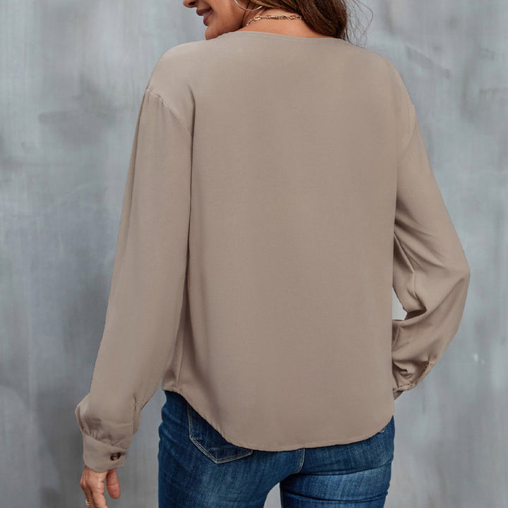 Blouse for women with asymmetrical collar and decorative button details Lune London