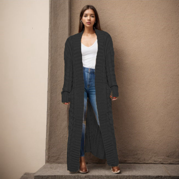 Women Thick knitted cardigan with a refined cable design and practical pockets Lune London
