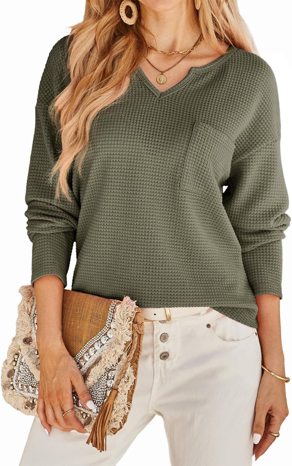 Women's sweater in textured waffle weave with deep V-neck and practical pockets Lune London
