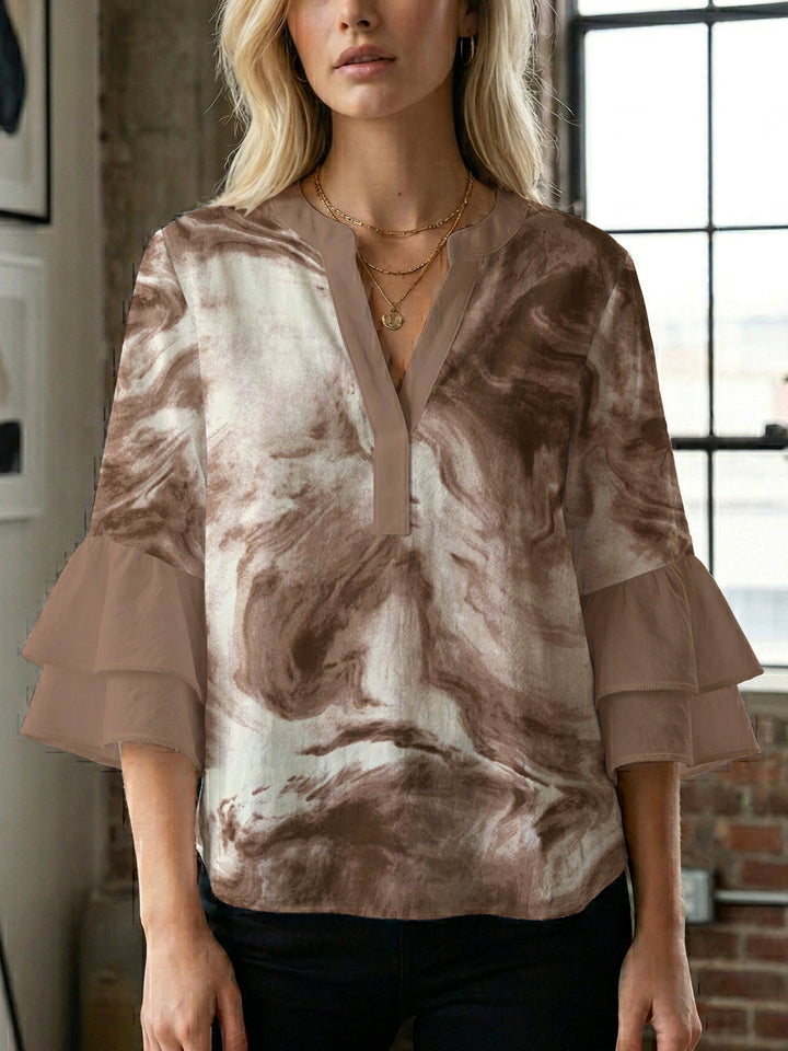 Women's casual blouse with ruffled sleeves and botanical print Lune London