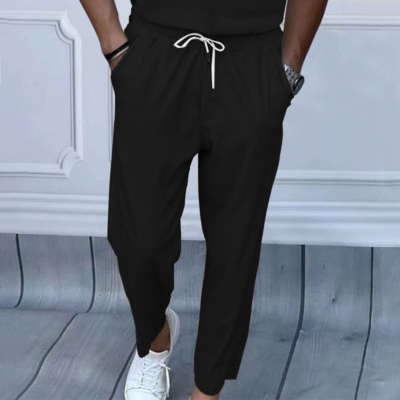 Casual men's jogger pants with elastic waistband and convenient pockets Lune London