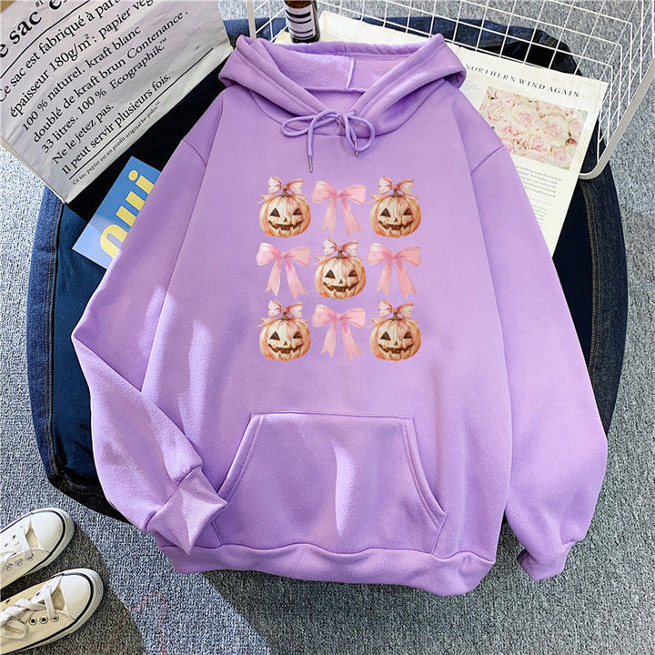 Women's Hoodie with Cheerful Pumpkin Design Chic & Stil