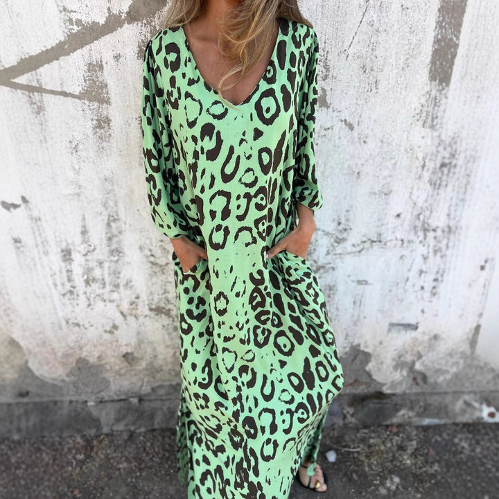 Maxi dress for women with a modern leopard pattern and practical pockets Lune London
