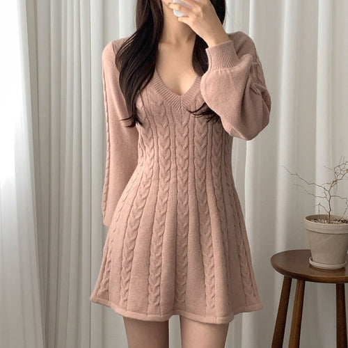 Robe en tricot pour femmes avec décolleté en V et design sans manches Chic & Stil