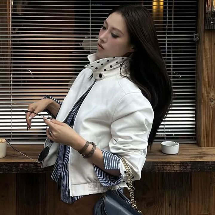 Women’s short-cut blouson jacket with stand-up collar, concealed zipper and contrasting polka dot patterned lining Amarae