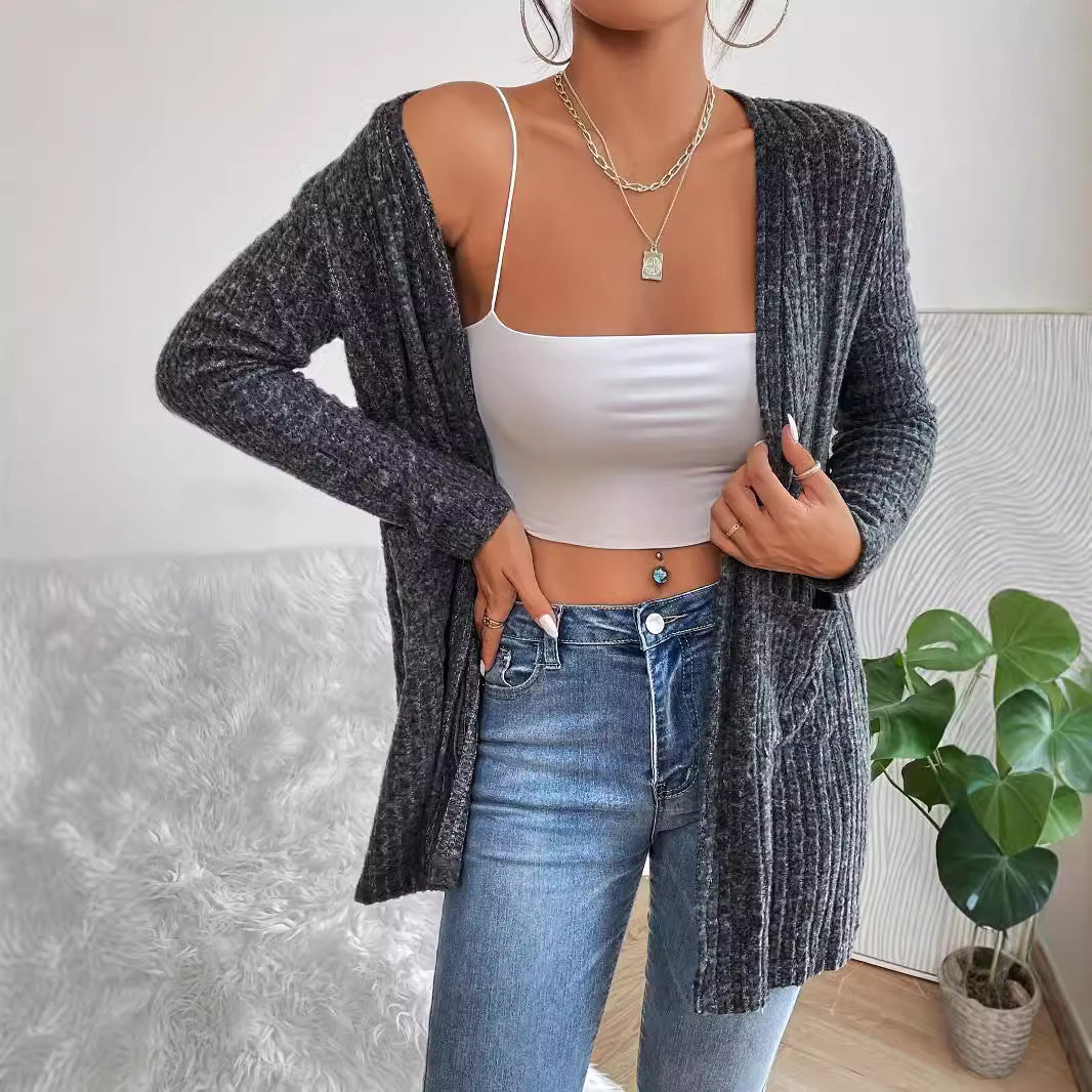 Women's knit jacket with textured ribbed design and practical pockets Lune London
