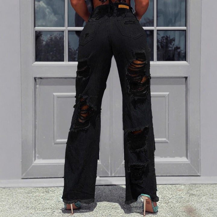 Ladies high-waisted destroyed jeans with wide legs and large knee rips Amarae