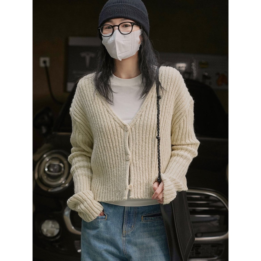 Women's Knitted V-Neck Cardigan in a distinctive ribbed pattern with short length and casual sleeves Amarae