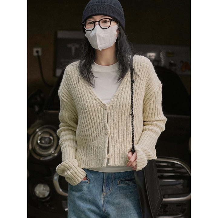 Women's Knitted V-Neck Cardigan in a distinctive ribbed pattern with short length and casual sleeves Amarae