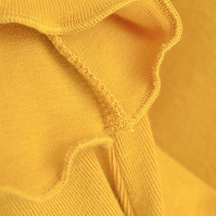 Women Fitted Long Sleeve Fine Knit Top with Square Neckline and Wave Hem Amarae