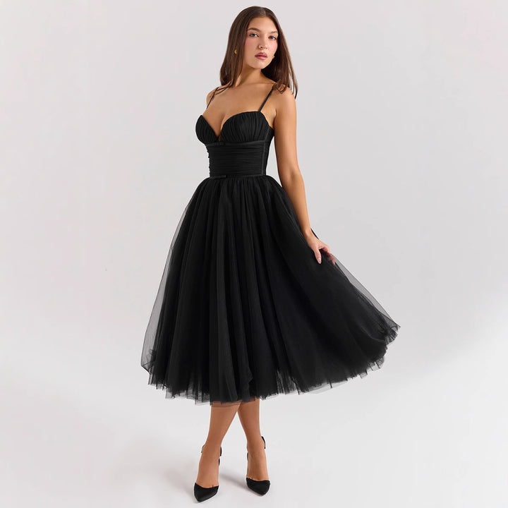 Ladies tulle dress with an elegant A-line silhouette and adjustable spaghetti straps Lune London