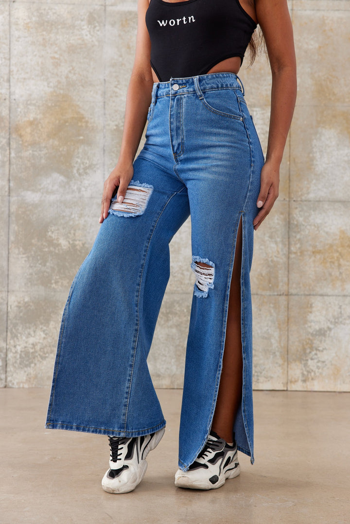 Women's high-waisted wide-leg jeans with large knee rips and side leg slits Amarae