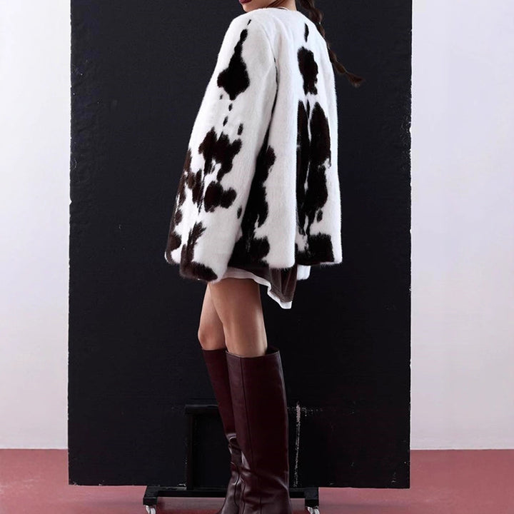 Women's short coat made of faux fur with boxy silhouette and cow print pattern Amarae