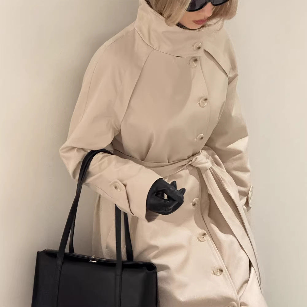Ladies maxilength trench coat with high stand-up collar, double-breasted button placket and tie belt Amarae